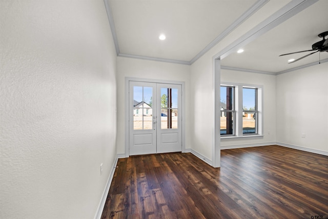 entryway featuring french doors, dark hardwood / wood-style flooring, ceiling fan, and ornamental molding