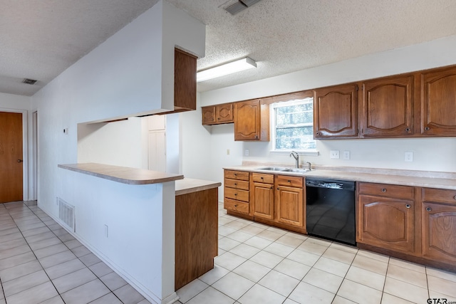 kitchen featuring dishwasher, kitchen peninsula, a textured ceiling, sink, and light tile patterned flooring