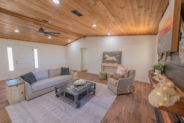 living room featuring ceiling fan, light hardwood / wood-style floors, wooden ceiling, and vaulted ceiling with beams