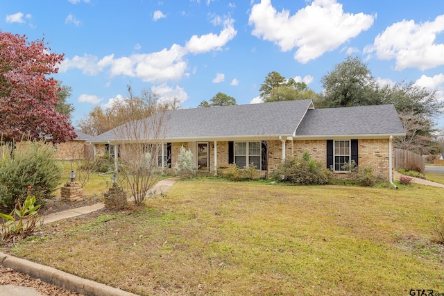 ranch-style house with a front lawn