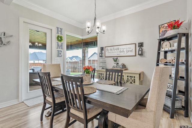 213 Serenity Dr, Bullard, TX 75757 - dining space featuring a chandelier, light wood-style floors, and ornamental molding