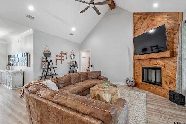 213 Serenity Dr, Bullard, TX 75757 - living room with light wood finished floors, ceiling fan, beam ceiling, recessed lighting, and a fireplace
