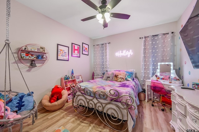 213 Serenity Dr, Bullard, TX 75757 - bedroom with wood finished floors and ceiling fan