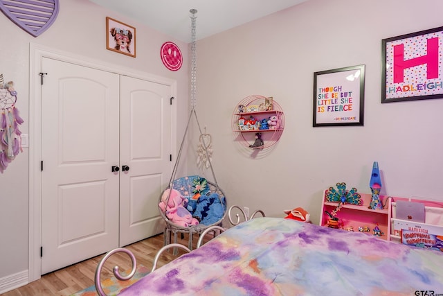 213 Serenity Dr, Bullard, TX 75757 - bedroom with wood finished floors and a closet