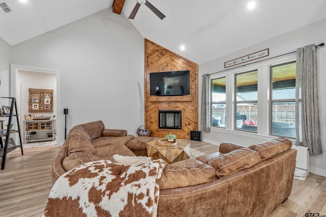 213 Serenity Dr, Bullard, TX 75757 - living room featuring a ceiling fan, light wood finished floors, a large fireplace, high vaulted ceiling, and recessed lighting