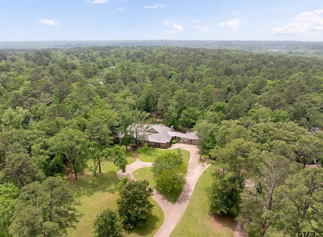 drone / aerial view with a forest view