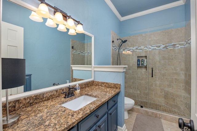 bathroom featuring vanity, ornamental molding, a stall shower, and toilet