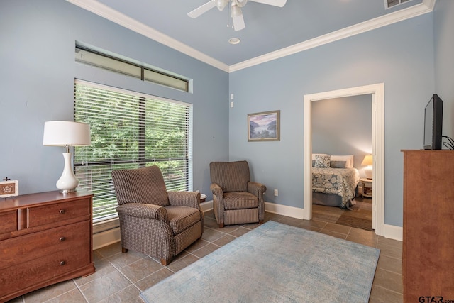 living area with a ceiling fan, visible vents, tile patterned flooring, baseboards, and ornamental molding
