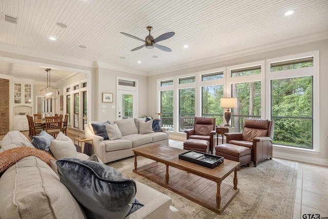 living room featuring ceiling fan, visible vents, light tile patterned floors, ornamental molding, and recessed lighting
