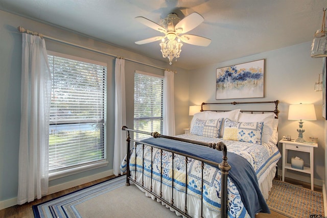 bedroom featuring wood-type flooring and ceiling fan