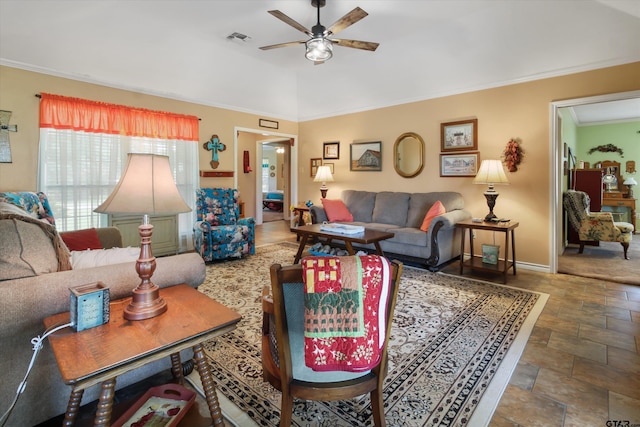 living room featuring ornamental molding and ceiling fan