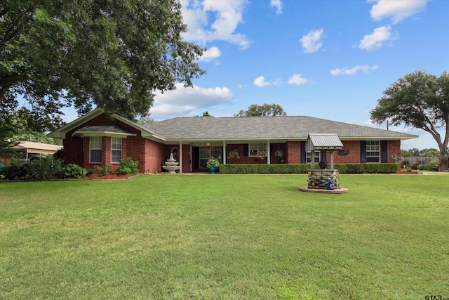 ranch-style house featuring a front lawn