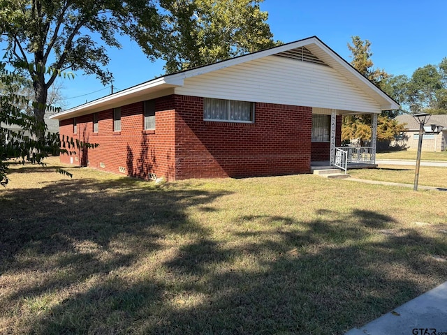 view of property exterior with a yard