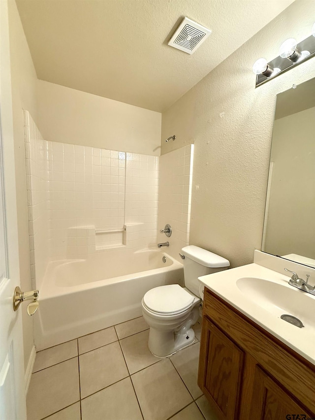 full bathroom featuring toilet, tub / shower combination, a textured ceiling, vanity, and tile patterned flooring