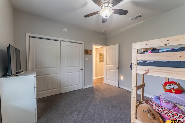 2014 Koby Cir, Sulphur Springs, TX 75482 - bedroom featuring dark carpet, a closet, a ceiling fan, and baseboards