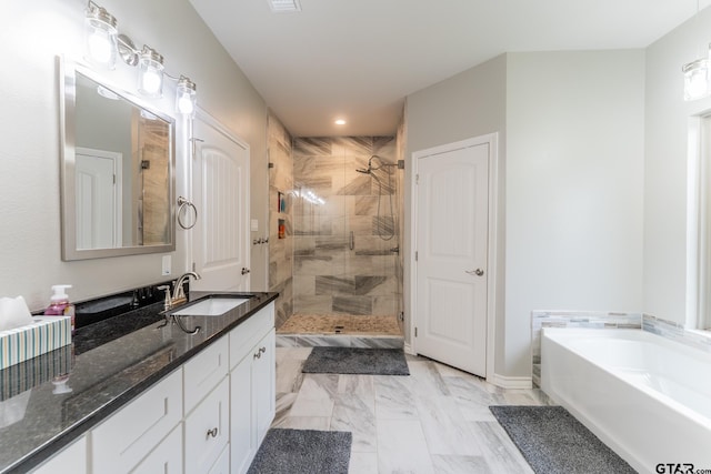 2014 Koby Cir, Sulphur Springs, TX 75482 - bathroom with a shower stall, vanity, a bath, marble finish flooring, and recessed lighting
