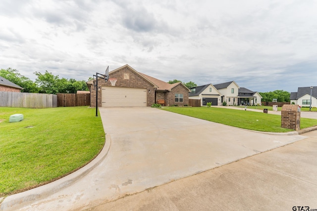 2014 Koby Cir, Sulphur Springs, TX 75482 - view of front of property featuring concrete driveway, a garage, and brick siding