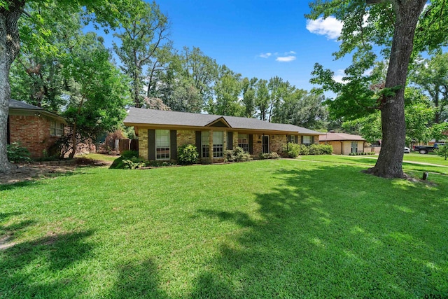 ranch-style house with a front yard