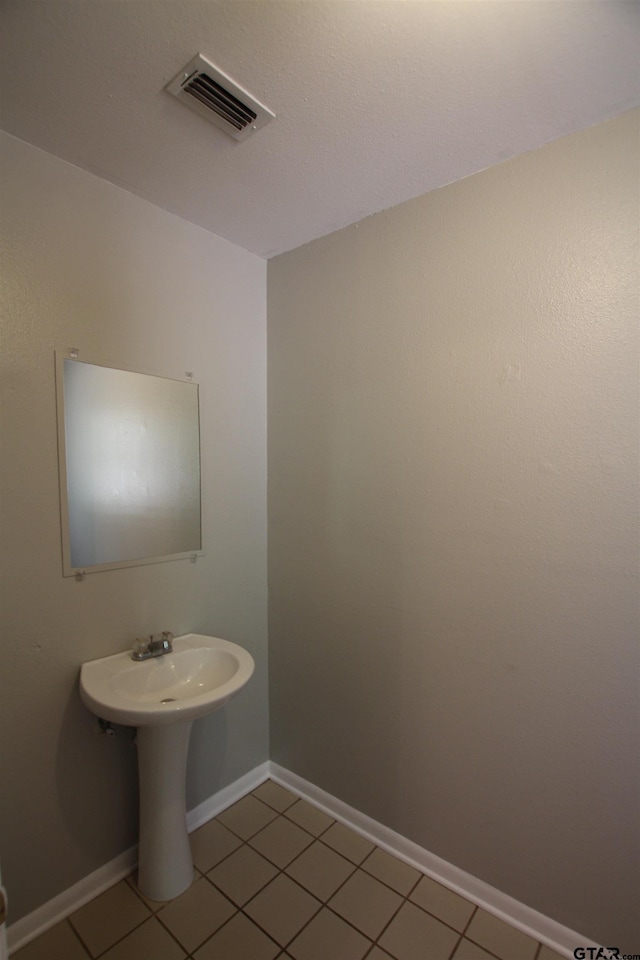 bathroom featuring tile patterned floors