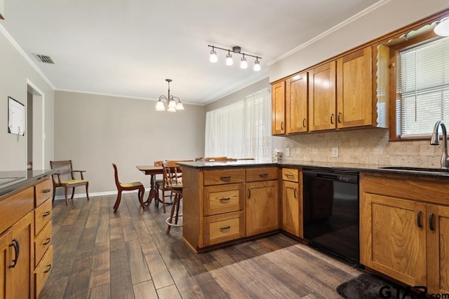 10516 Debbie Ln, Flint, TX 75762 - kitchen with black dishwasher, brown cabinetry, dark countertops, a peninsula, and ornamental molding