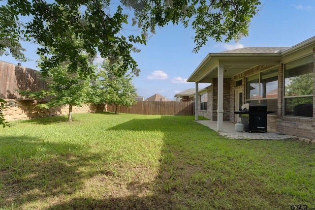 5821 Thompson Pl, Tyler, TX 75707 - fenced backyard featuring a patio