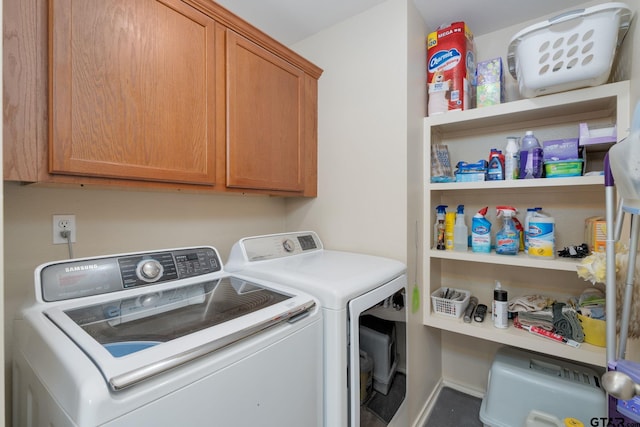 5821 Thompson Pl, Tyler, TX 75707 - laundry room featuring washer and clothes dryer and cabinet space