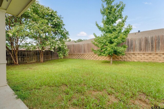 5821 Thompson Pl, Tyler, TX 75707 - view of fenced backyard