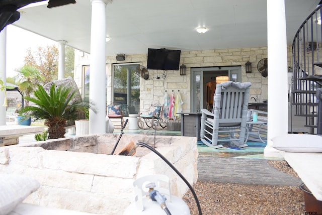 view of patio featuring a porch
