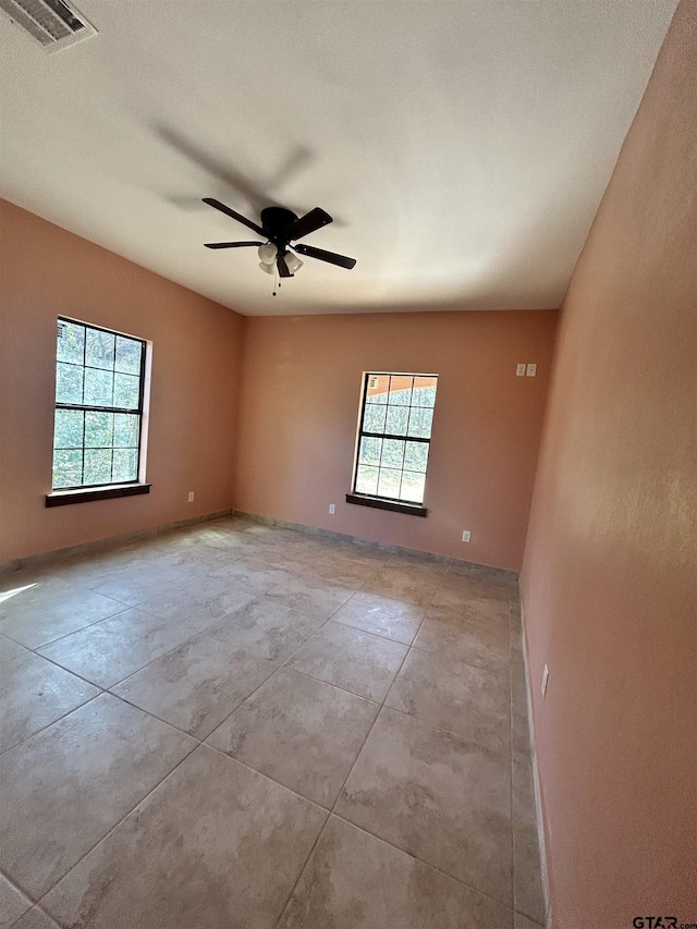 empty room with ceiling fan