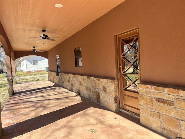 view of patio with ceiling fan