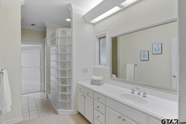 bathroom with vanity, tile patterned floors, and ornamental molding