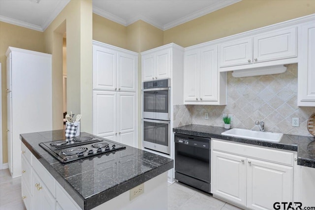 kitchen with black appliances, sink, a kitchen island, backsplash, and white cabinetry