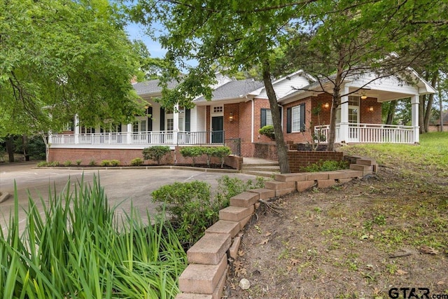 view of front of home featuring covered porch