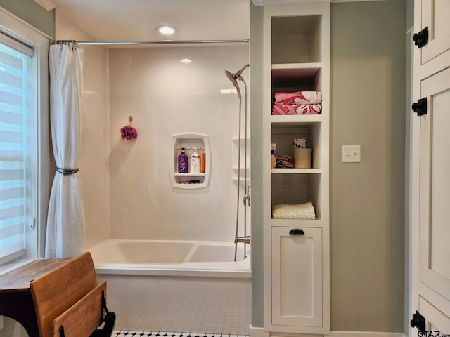 bathroom featuring tile patterned flooring and shower / tub combo