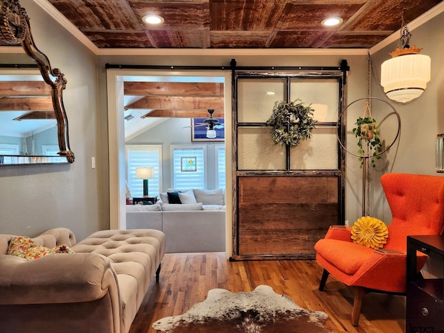 living area featuring wood ceiling, vaulted ceiling with beams, hardwood / wood-style flooring, and ornamental molding