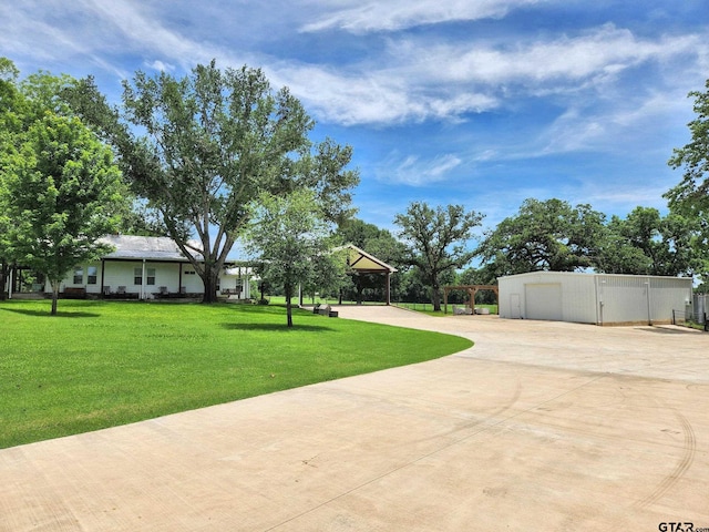 view of yard with a garage