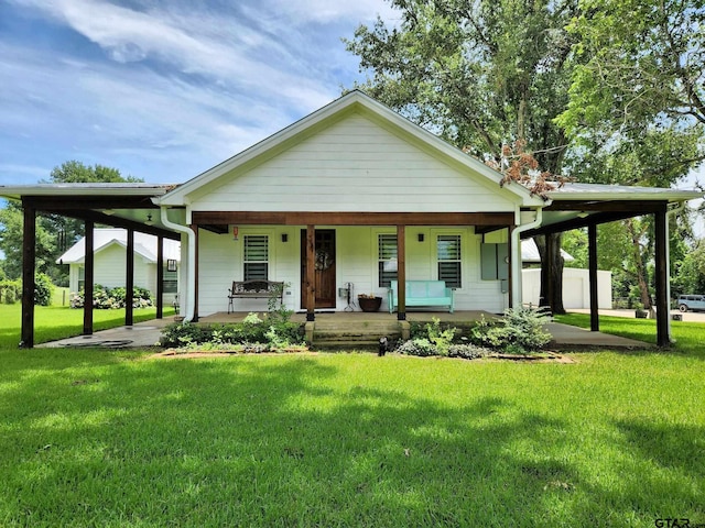 view of front of home with a front lawn and covered porch