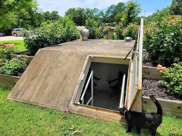 view of entry to storm shelter