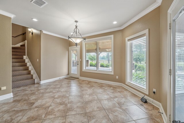 2441 Fm 2685, Gilmer, TX 75644 - unfurnished dining area featuring crown molding, stairway, recessed lighting, baseboards, and light tile patterned flooring
