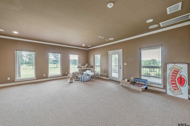 2441 Fm 2685, Gilmer, TX 75644 - sitting room featuring ornamental molding, plenty of natural light, baseboards, carpet flooring, and recessed lighting