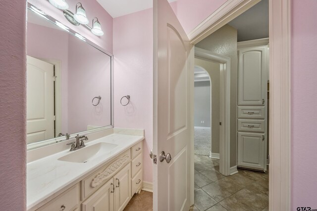 2441 Fm 2685, Gilmer, TX 75644 - bathroom featuring vanity, tile patterned flooring, and baseboards