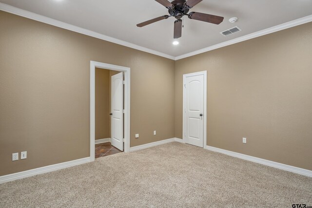 2441 Fm 2685, Gilmer, TX 75644 - unfurnished bedroom with carpet flooring, crown molding, baseboards, a ceiling fan, and recessed lighting