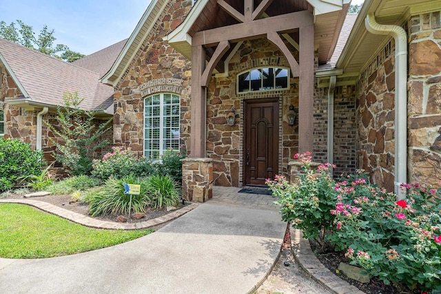 2441 Fm 2685, Gilmer, TX 75644 - entrance to property with stone siding and a shingled roof