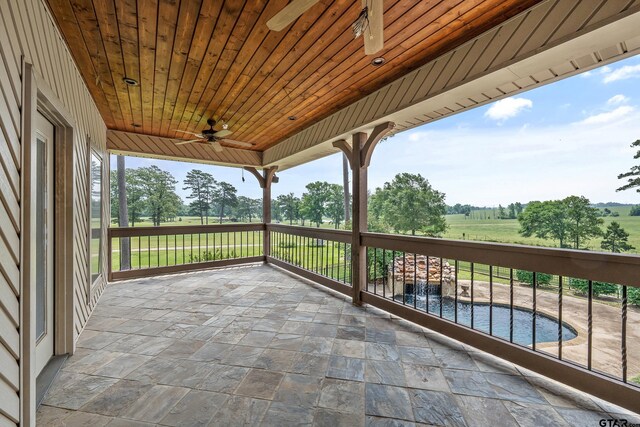 2441 Fm 2685, Gilmer, TX 75644 - view of patio with a ceiling fan and a view of countryside
