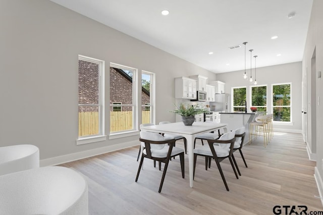 16330 Crossing Cir, Lindale, TX 75771 - dining area with light wood-type flooring and recessed lighting