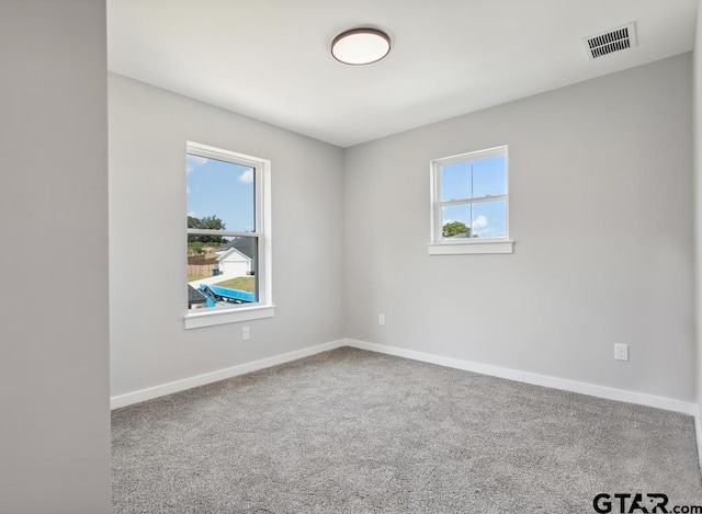 16330 Crossing Cir, Lindale, TX 75771 - carpeted empty room with baseboards