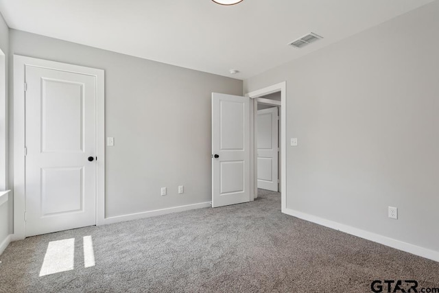 16330 Crossing Cir, Lindale, TX 75771 - unfurnished bedroom with carpet flooring and baseboards