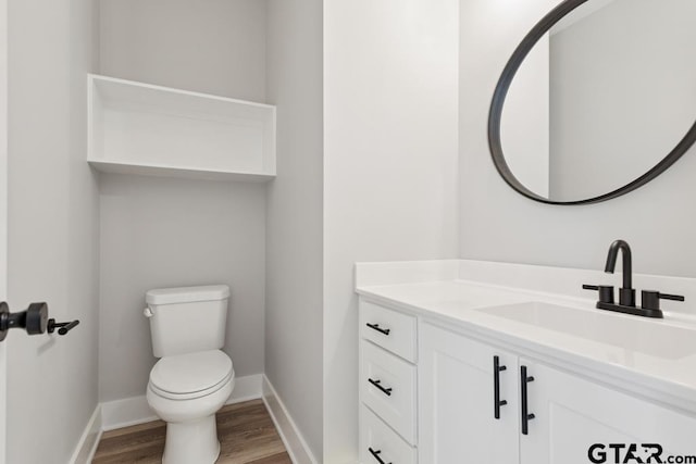 16330 Crossing Cir, Lindale, TX 75771 - half bath featuring vanity and wood finished floors