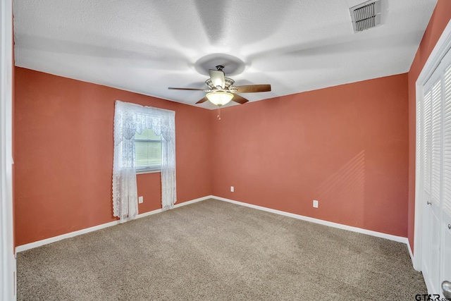 386 Fm 1711, Jacksonville, TX 75766 - unfurnished bedroom featuring visible vents, baseboards, a closet, and carpet floors