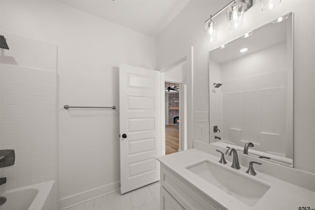 bathroom featuring vanity and shower / washtub combination